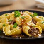 Delicious Philly Cheesesteak Tortellini Pasta served on a plate, an enticing mix of flavors showcasing pasta, beef, and cheese.